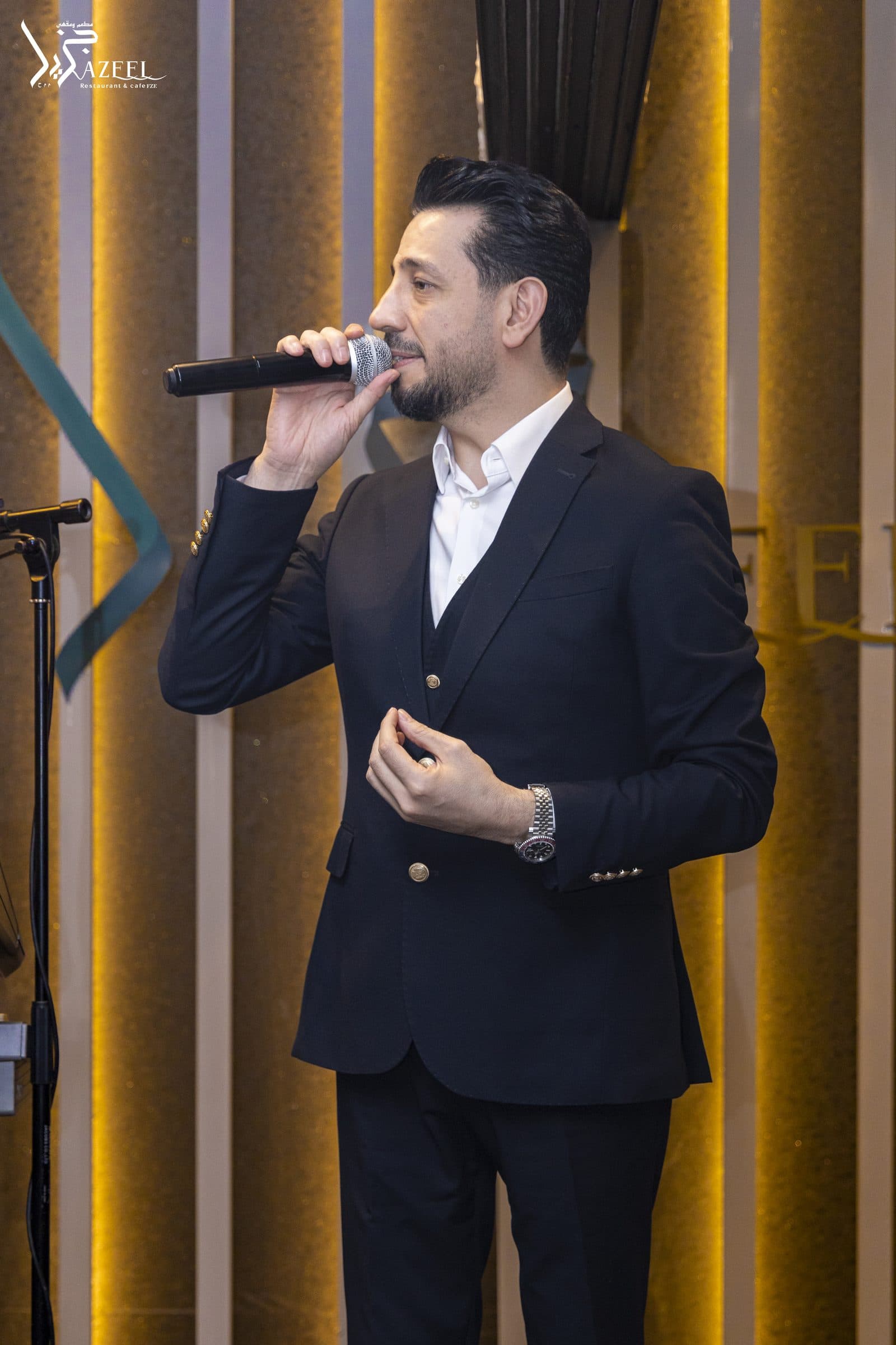 A singer performing live at Jazeel